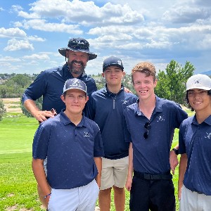 The AAHS Boys Golf team and their coach.